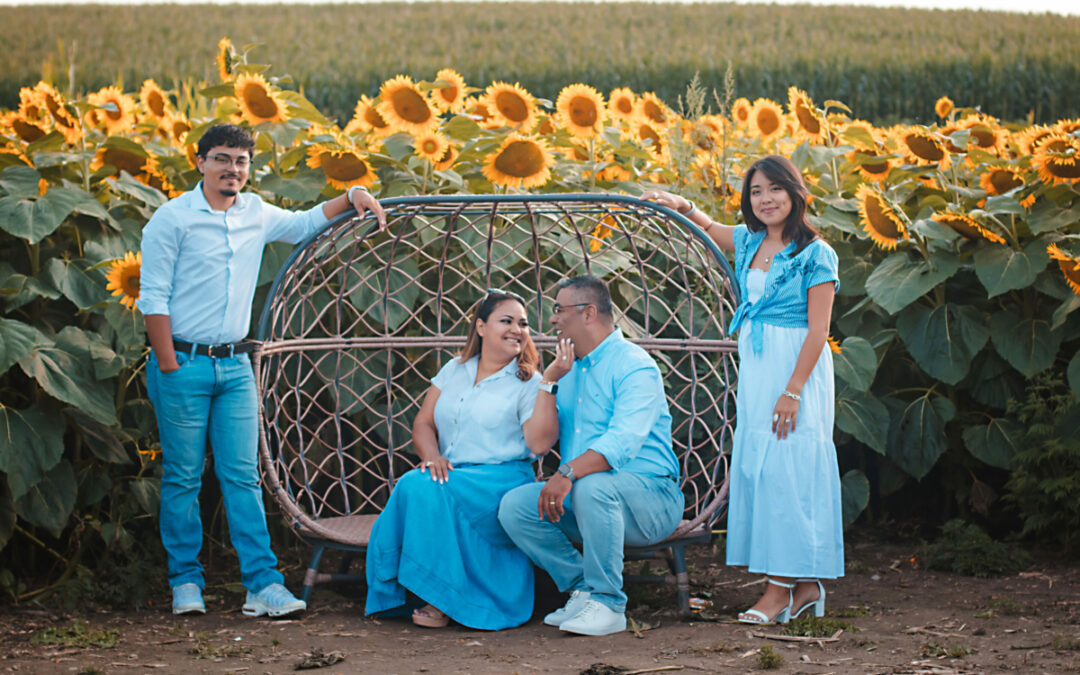 Family photo session at the sunflower farm